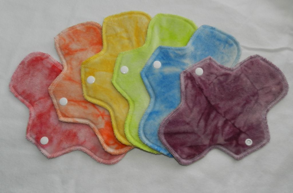 A rainbow of 6, 8" hand dyed organic bamboo velour liners by MotherMoonPads (topped with a super sof